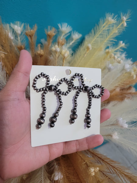 Navajo pearl inspired bow studs #8