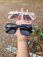 Her branded sunnies