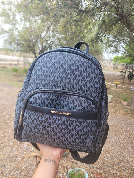 Michael monogram backpack
