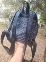Michael monogram backpack