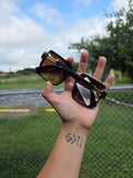 H branded sunnies with dust bag