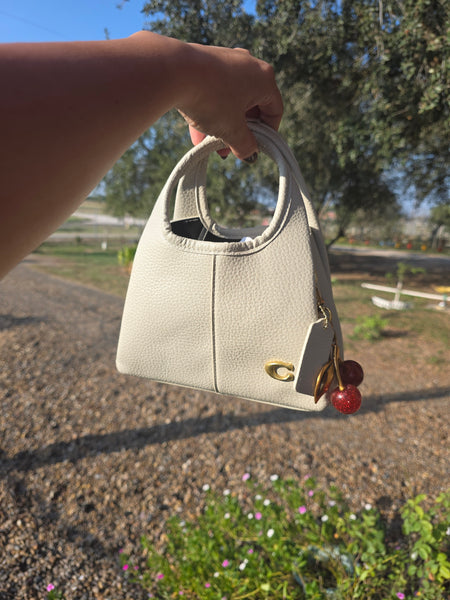 Co Lan small handbag with crossbody strap (pink, red, grey)