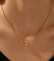 18k Nudo hoops, studs and necklace