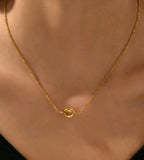 18k Nudo hoops, studs and necklace