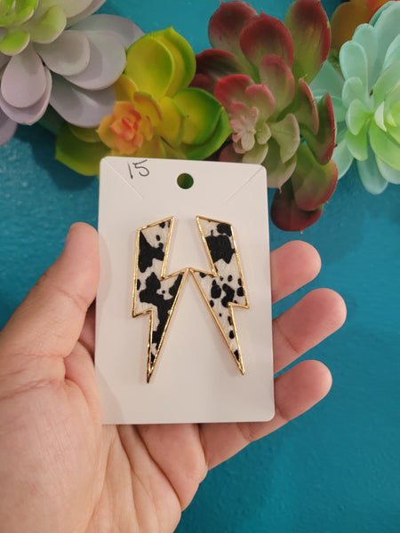 Bolt cow print studs #15